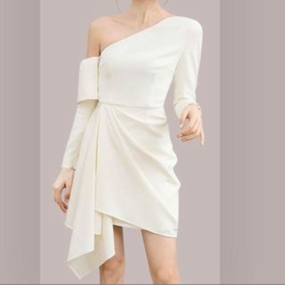 New without tags never worn white dress with asymmetrical statement detail